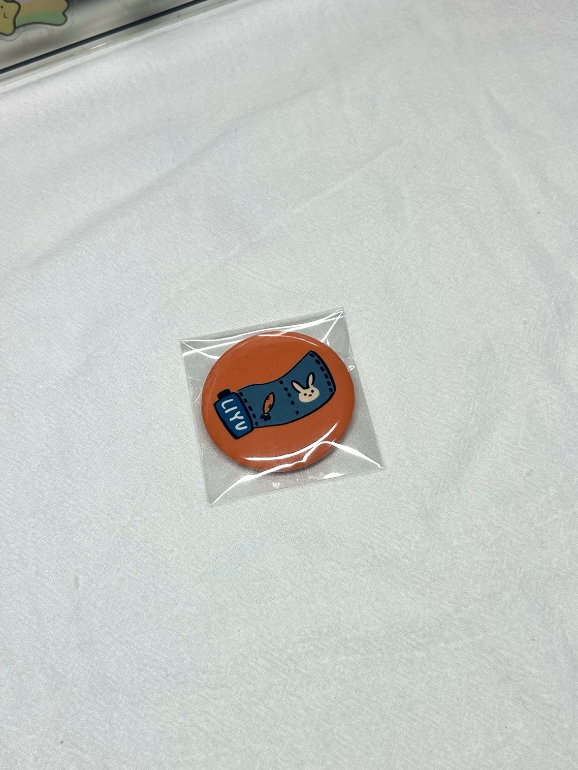 崔立于飯咪徽章