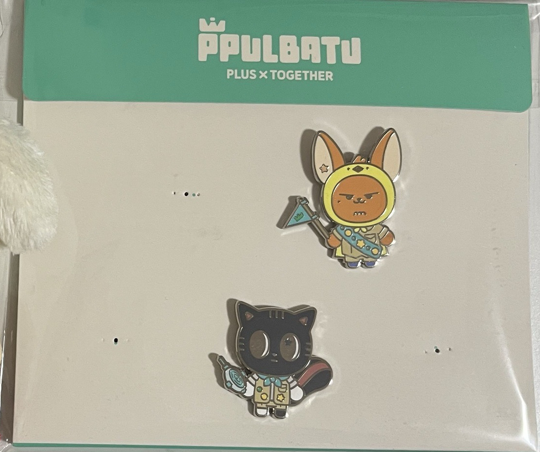 黃春、松喵徽章