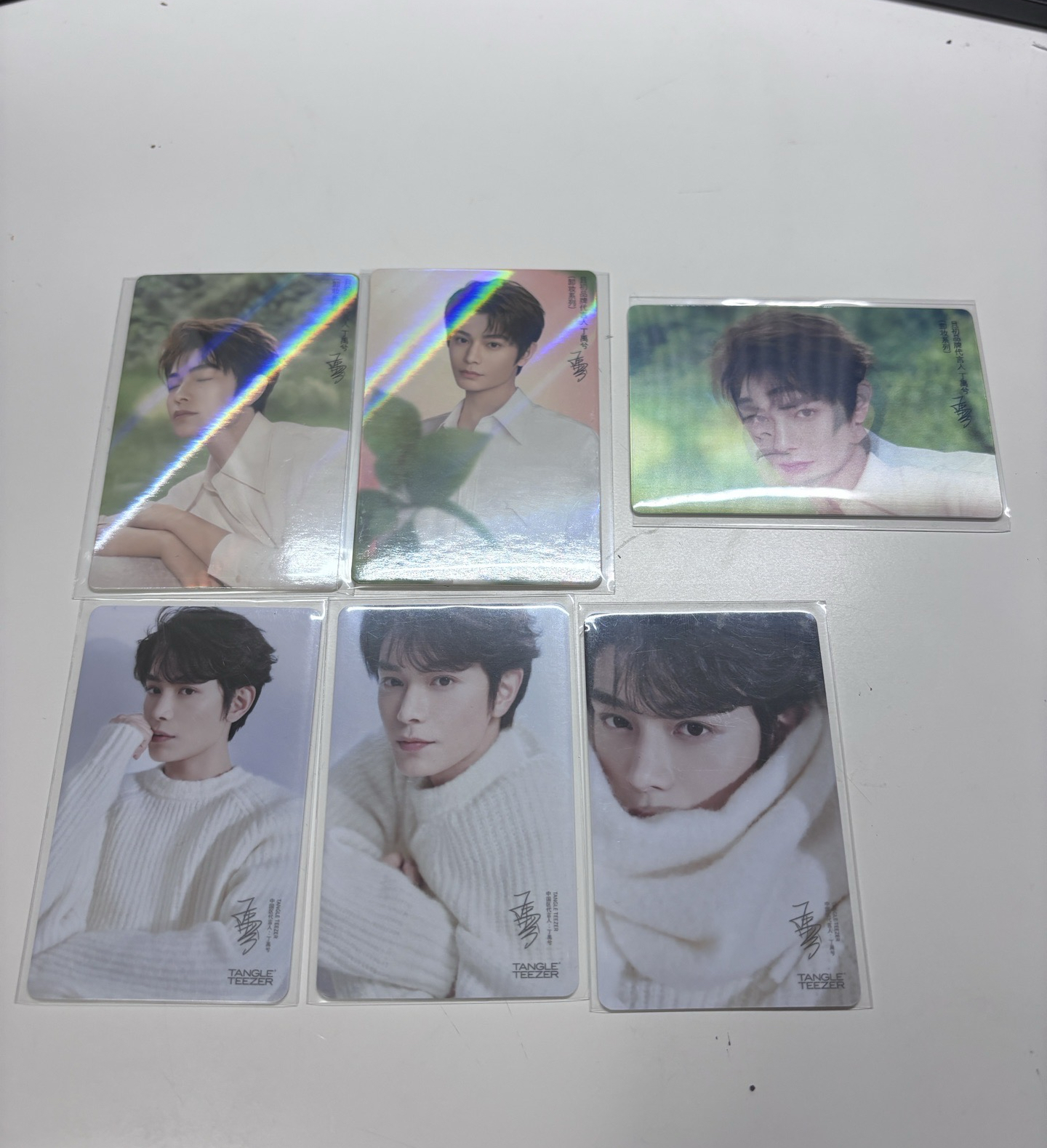 丁禹兮且初代言卡（上排三張）