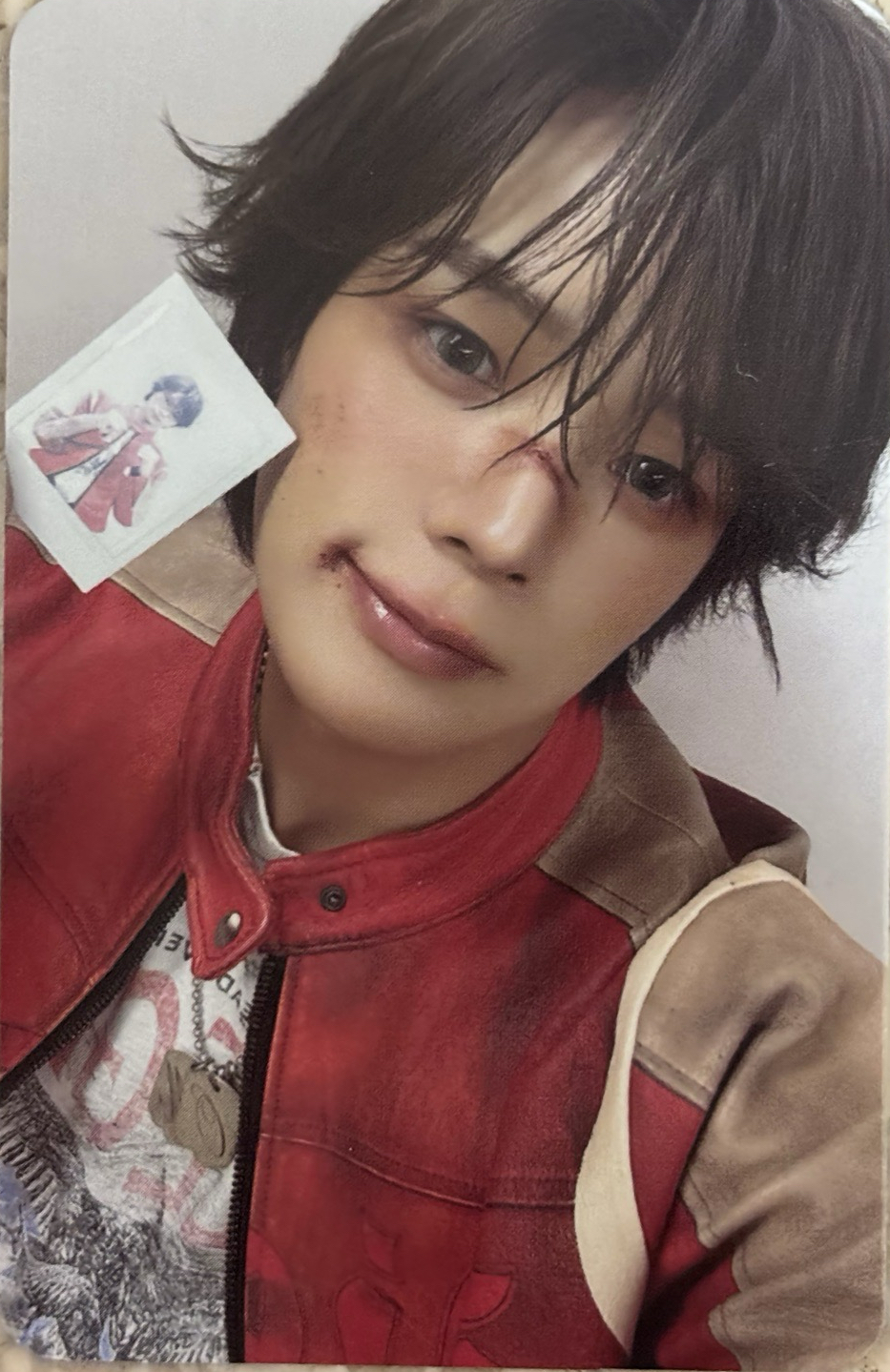 拿著自己的拍立得